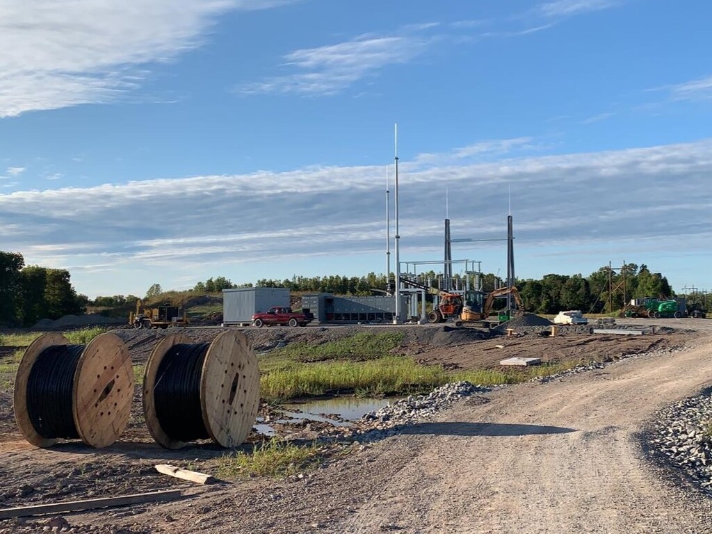 dirt road with electrical equipment